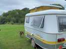 Yellow eriba caravan at la cour de la grange