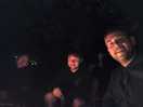 Glowing faces round the fire pit