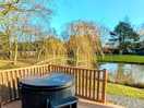 Hot tub and decked area outside the pod