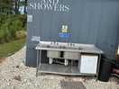Toilet and shower block