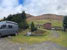 Campervan on the stybeck farm pitch with electrical hook-up.