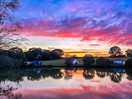 Stunning lakeside reflection of the sunset.