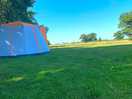A lovely pitch with electric hookup and uninterrupted views of the surrounding cheshire countryside