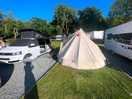 Our camper van and awning set up on hard standing pitch