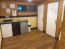 Washing up and freezer and fridge room.