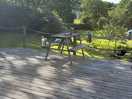 Picnic tables located near pitch.