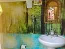 W/c and wash hand basin, water very hot