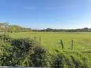 View of field beyond the shepherds hut.