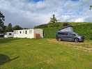 Nice little camp site with static caravan for two toilets and a shower block