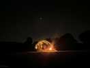Cosy campfire at night.