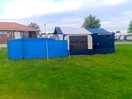 Pitch at side of toilet block 104