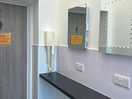 Toilet/shower block