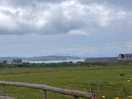 View from the pitched area over the bay with snowdonia in the background