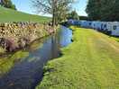 Beautiful stream behind the caravans