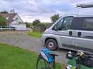 Our pitch with toilet block on the left and a distant view of the sea