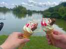 A perfect weekend moment – ice cream in hand, peaceful nature all around, and calm by the water.