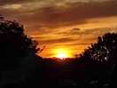 Sunset captured by my daughter while we were chilling by a tent.