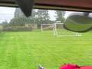 Lovely flat sheltered lawn with moveable goalposts!