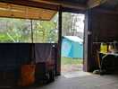 The hut with toilets and showers on the side.