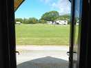 View of campsite from inside pod