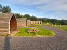 Main site lodges and camper van pitches