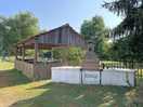 Barbecue and covered eating area, you can hire your own private barbecue too.