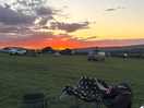 Amazing sunset view looking out onto the stunning green grass hills.