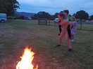Kids playing near fire