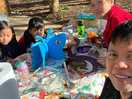 Family enjoy eating breakfast