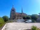 Village church bells ring on the hour