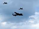 Lancaster bomber, spitfire and hurricane carrying out a test flight