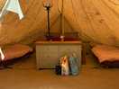 Inside the tent, double bed and two singles