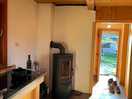 The kitchen and fireplace