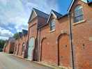 Typical red brick farm buildings in the vale of york
