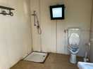 This is the toilet/shower for about 8 camping spaces. didn’t feel clean