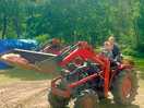 Lovely lady gave my vehicle obsessed boy a ride on the tractor she was so lovely