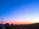 View from the back of the field at sundown. facing the ocean.