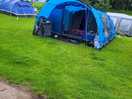 Electric grass tent pitch