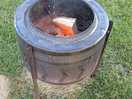 The fire pits are recycled washer drums. they work great! wood and starter kits available.