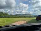 View as driving into campsite, big spaced out field
