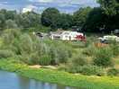 Campsite from bridge over river