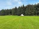 Bell tent at the top of the field
