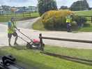 Mowing the lawn on our pitch!