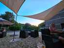 Relaxing outside bar area.