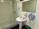 Private shower rooms with attached toilets
