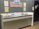 Wash area outside toilets