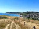 The view from the side hill next to the site into the beach.