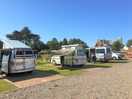 5 hard standing with grass pitches.