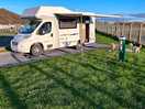 Parking for 10vans,clean and close to town and beach but no toilet facilities