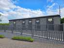 Toilet and shower block, with kitchen.